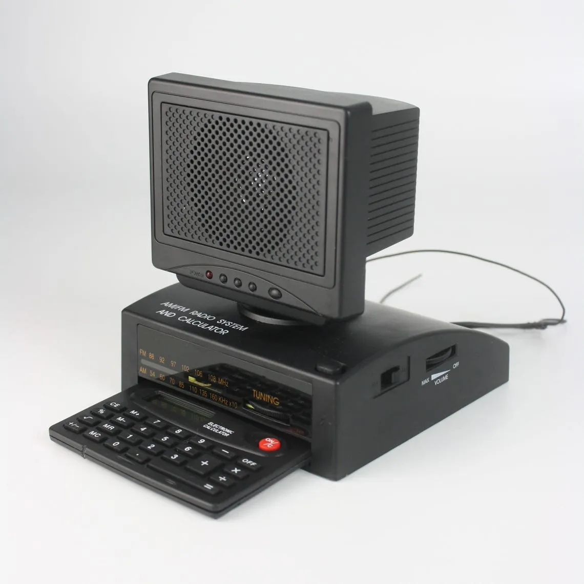 A power bank on a wooden table with poor lighting